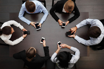 business people with mobile phones