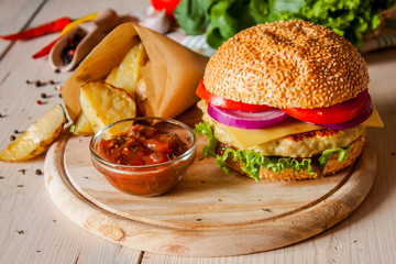 burger with fried potatos 