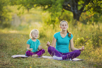 Mom and child in the lotus position