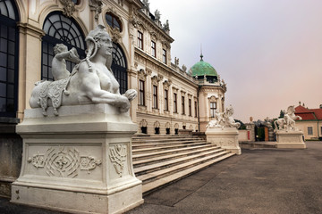 Fototapeta na wymiar sculptures at the entrance Belvedere palace, Vienna, Austria
