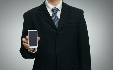 businessman in a suit with smartphone
