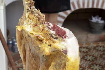 Detail of iberian ham placed in ham holder