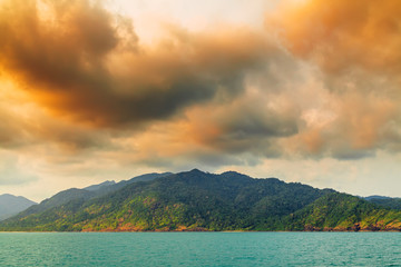 Sunrise sky above sea island, landscape