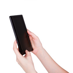 Female hands holding a tablet touch computer gadget