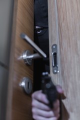 Dangerous burglar with gun