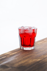 red drink with ice