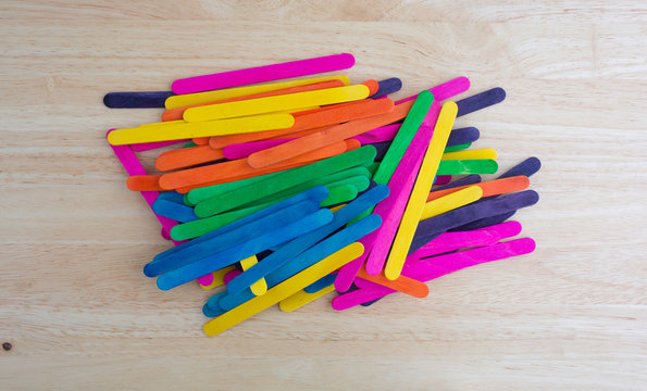 Arts and crafts sticks on a wood table