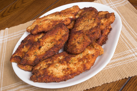 Platter of fried Italian chicken cutlets