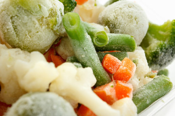 Frozen vegetables with ice