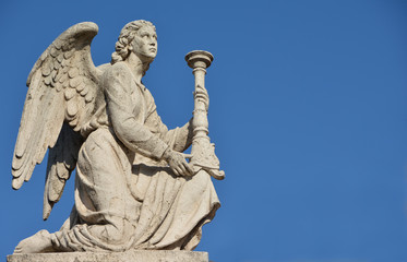 Angel with blue sky and copy space