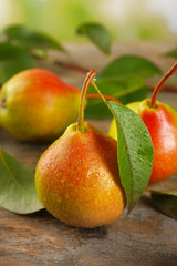Fresh pears on wooden table, closeup