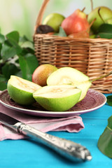 Fresh pears on wooden table, closeup
