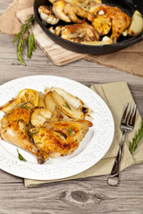Garlic, Lemon and Rosemary Roasted Chicken. Selective focus.