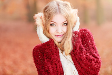 Pretty gorgeous woman in earmuffs.