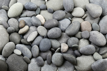 Gray sea pebbles background