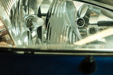 Closeup of car headlight detail
