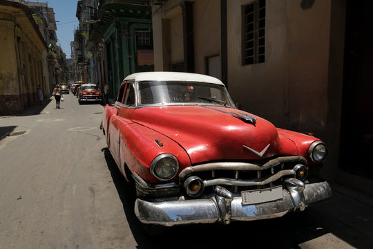 Red classic car in Cuba