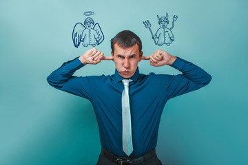 man businessman covering his ears whispers thoughts of an angel 
