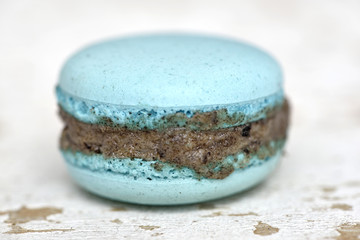 Blue macron on wood plate