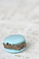 Blue macron on wood plate