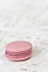 Pink macron on wood plate