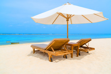 Lounge chairs on a tropical beach