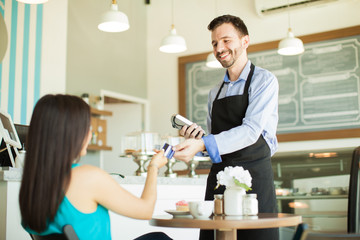 Paying with credit card in a cafe