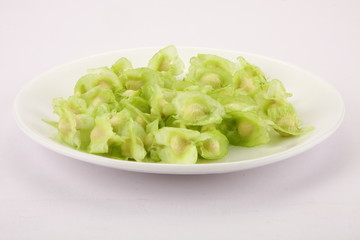 Plate of  Organic moringa seeds .