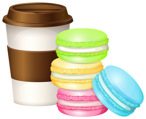 Coffee cup and colorful macaron