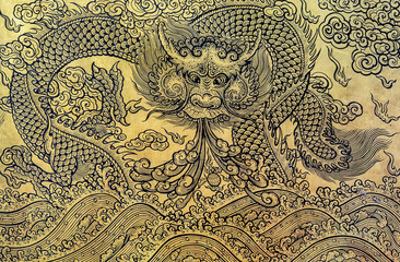 Fototapeta na wymiar Gold leaf art of Chinese dragon