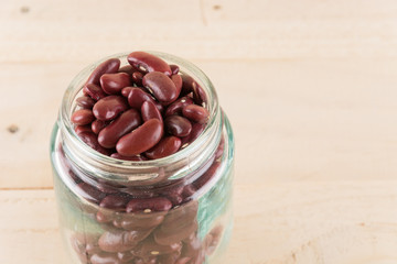 red beans on wood background