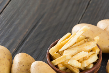 french fries on wood background