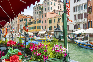 Naklejka premium Sidewalk Cafe in Grand Canal of Venice, Italy