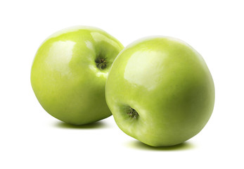 2 whole glossy green apples isolated on white background