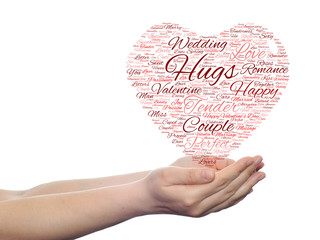 Conceptual Valentine heart word cloud in hands