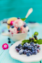 Blueberries, fresh blueberries and ice cream with blueberries, dessert
