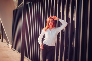 Fashion redhead young woman