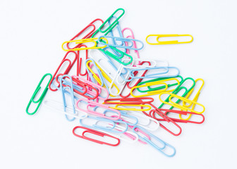 Bunch of paper clips on white background