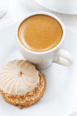 cup of espresso and cakes, top view