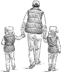 father with his daughters on a stroll
