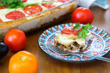 Moussaka dish with aubergine and chili pepper, greek meal