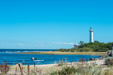 Fototapeta na wymiar Lighthouse Lange Erik (= Tall Erik) on the northern point of Swedish Baltic Sea island Oland. 