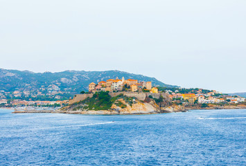 Fototapeta premium Medieval village of Calvi on rocky hill, island Corsica, France