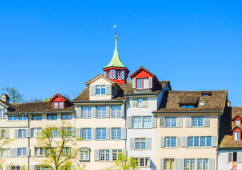 Unique building and roof top with blue sky in summertime in Zurich, Switzerland 
