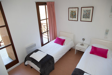 Two single beds in a cosy cottage