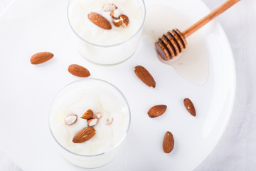 Homemade yogurt with honey and almonds.selective focus