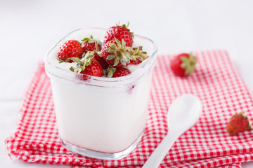 Homemade yoghurt with fresh strawberries.selective focus