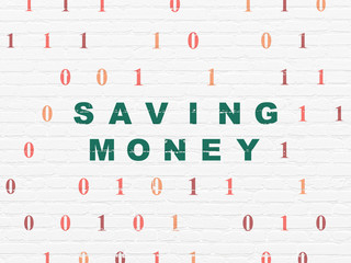 Finance concept: Saving Money on wall background