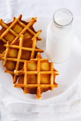 Belgian waffles with milk .selective focus