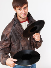 Man with acoustic LPs